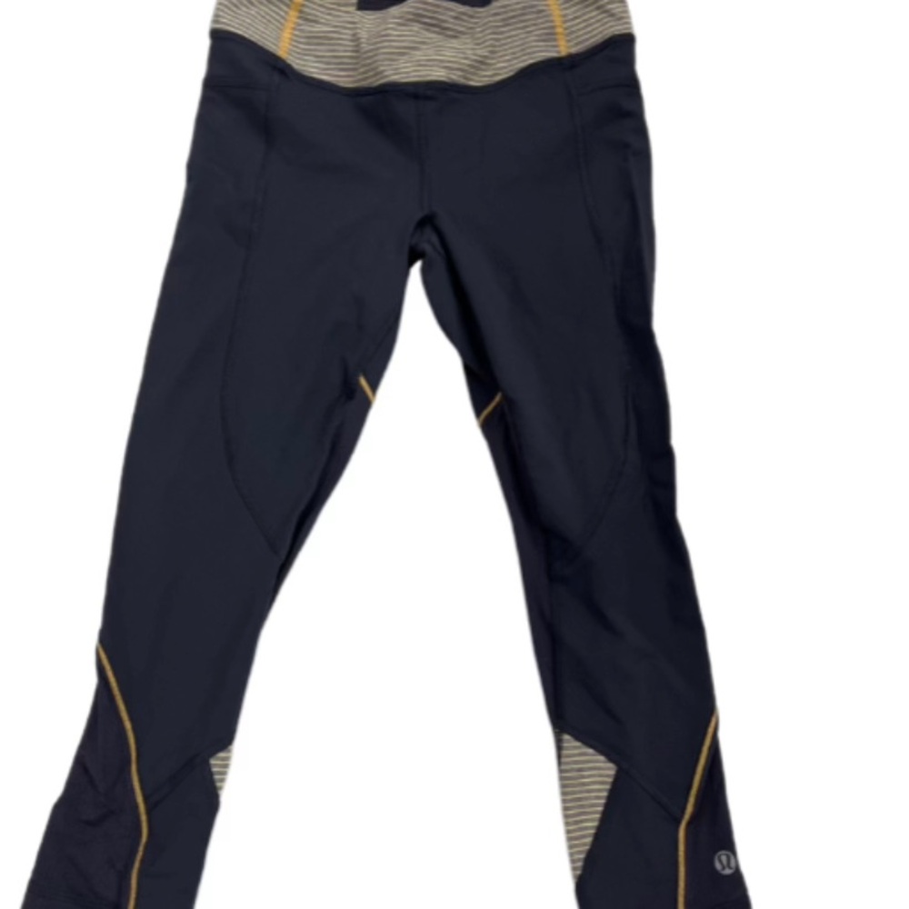 Lululemon Black and Gold Capri Athletic Leggings, size 4